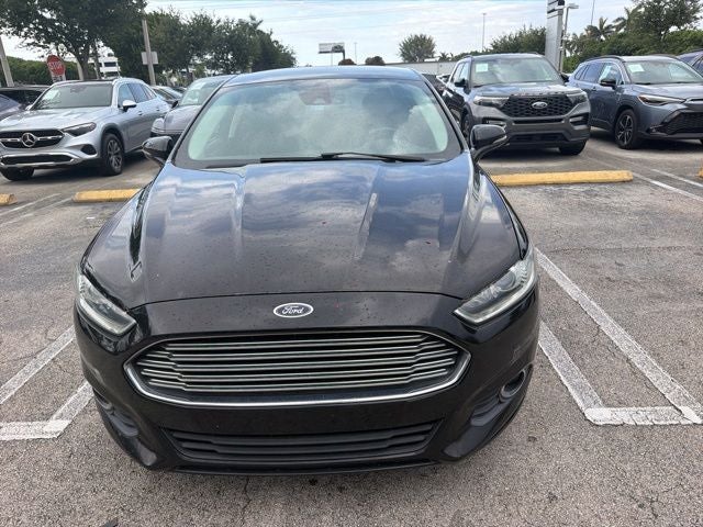 Used 2016 Ford Fusion Energi SE Luxury with VIN 3FA6P0PU6GR275239 for sale in Doral, FL
