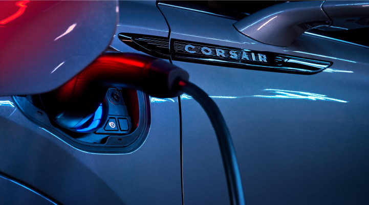 A charger plugged into the charging port of a 2025 Lincoln Corsair® Plug-in Hybrid model. | Doral Lincoln in Doral FL
